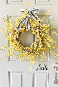 spring yellow forsythia wreath hang on front door